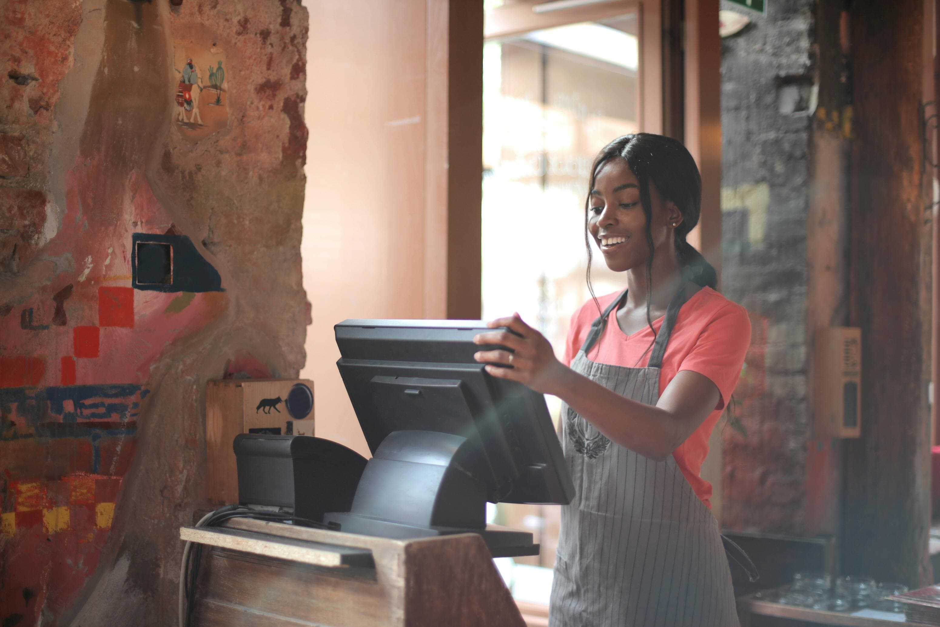 Front-of-house host checking app in lounge